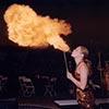 Fire eater performer providing entertainment at novel NYC event