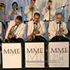 Live tiered bandstand musically performing at upscale NYC event