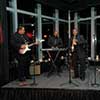 Classy jazz band performing music live on stage at event