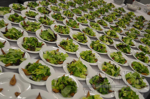 salads displayed at a catered corporate event